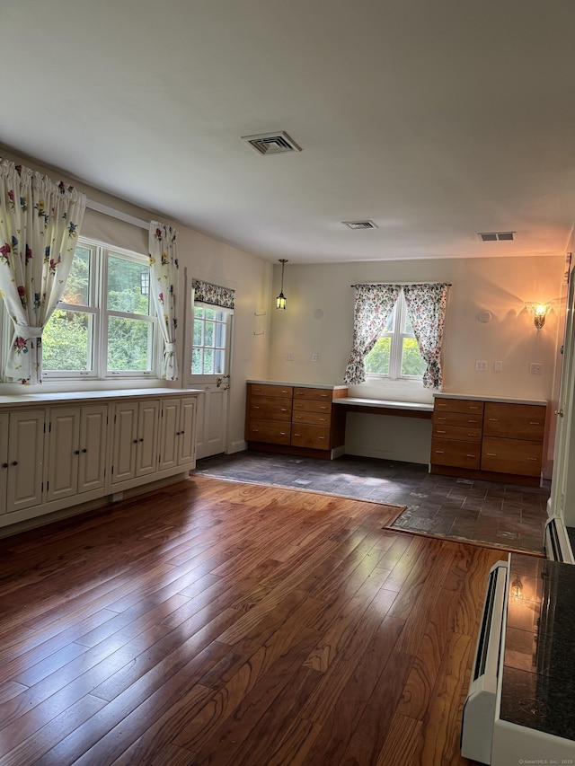 23 Mountain Rd, Mansfield, CT 06250 - spare room featuring plenty of natural light and dark wood-style flooring