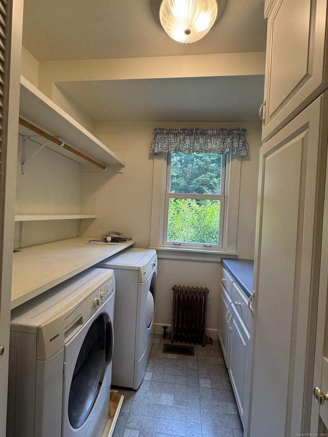 23 Mountain Rd, Mansfield, CT 06250 - laundry room featuring radiator, separate washer and dryer, and cabinet space