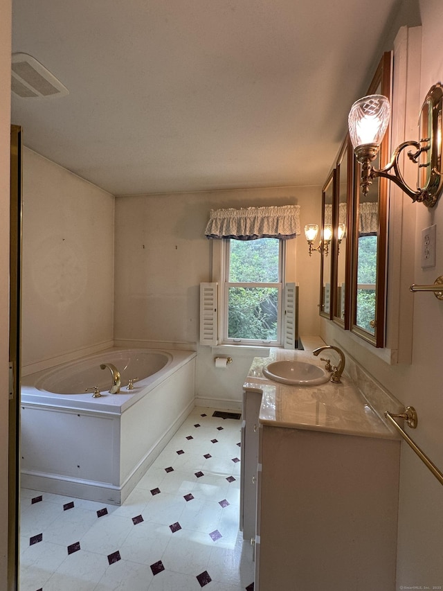 23 Mountain Rd, Mansfield, CT 06250 - full bathroom with tile patterned floors, vanity, and a garden tub