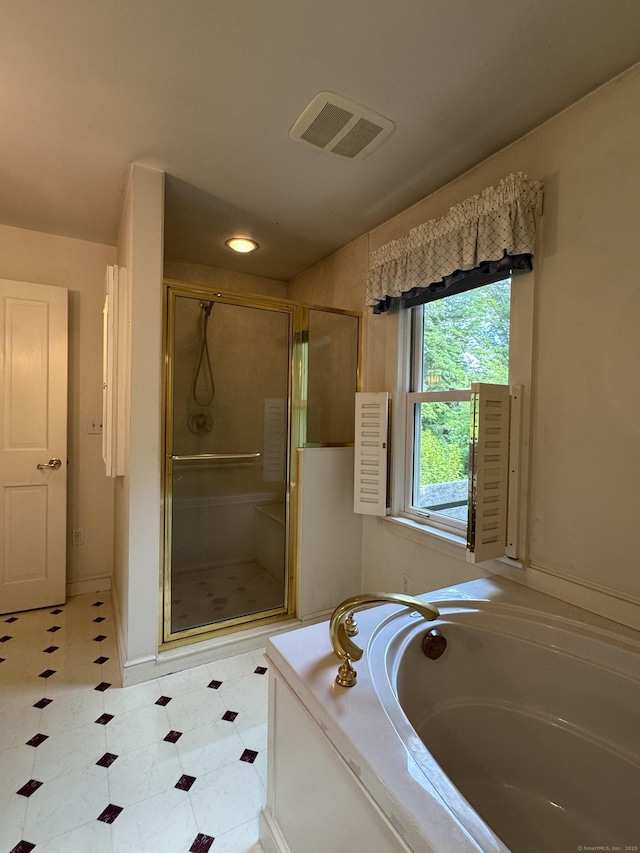 23 Mountain Rd, Mansfield, CT 06250 - full bathroom featuring a shower stall, a garden tub, and tile patterned floors