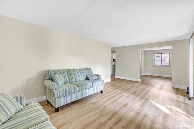 23 Happy Hollow Cir Unit B, Stratford, CT 06614 - living area with light wood-type flooring and baseboards