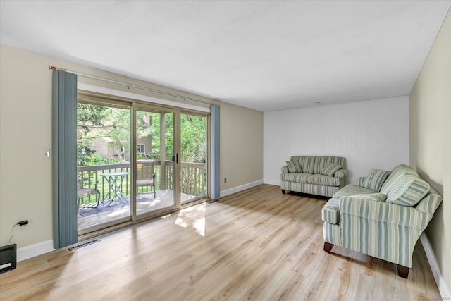 23 Happy Hollow Cir Unit B, Stratford, CT 06614 - living area featuring wood finished floors and baseboards
