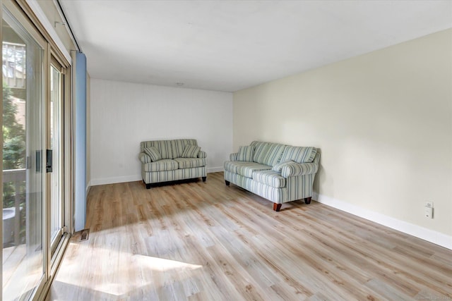 23 Happy Hollow Cir Unit B, Stratford, CT 06614 - living area featuring wood finished floors and baseboards