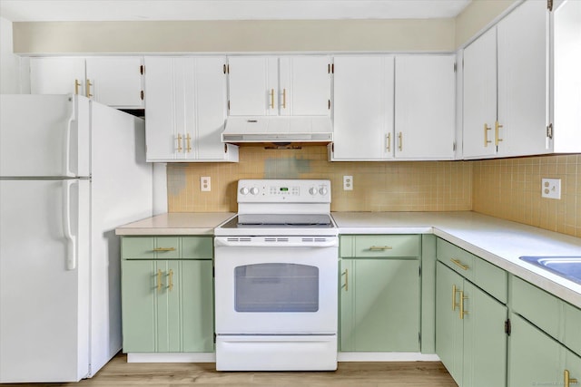 23 Happy Hollow Cir Unit B, Stratford, CT 06614 - kitchen with white appliances, custom range hood, light countertops, and green cabinetry