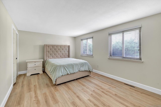 23 Happy Hollow Cir Unit B, Stratford, CT 06614 - bedroom featuring light wood finished floors and baseboards