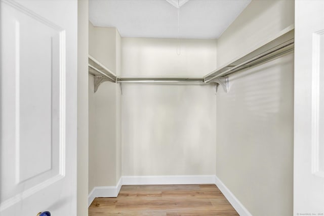 23 Happy Hollow Cir Unit B, Stratford, CT 06614 - spacious closet featuring light wood-style flooring