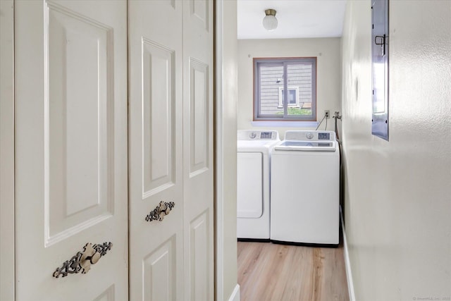 23 Happy Hollow Cir Unit B, Stratford, CT 06614 - laundry room with washer and dryer and light wood finished floors