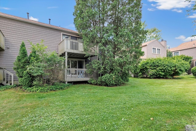 23 Happy Hollow Cir Unit B, Stratford, CT 06614 - view of green lawn with a wooden deck and a balcony