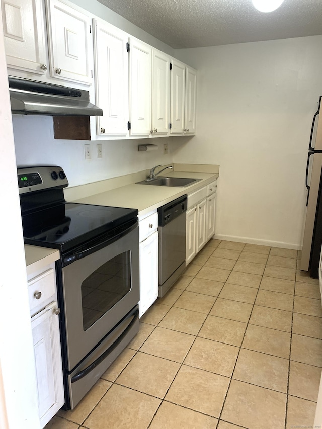 90 Kane St Apt C3, West Hartford, CT 06119 - kitchen with appliances with stainless steel finishes, under cabinet range hood, white cabinets, light tile patterned floors, and a textured ceiling