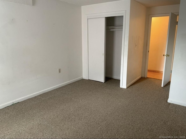 90 Kane St Apt C3, West Hartford, CT 06119 - unfurnished bedroom featuring carpet and a closet