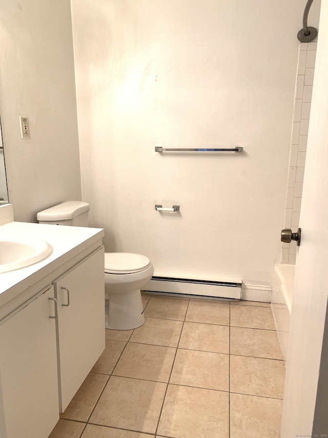 90 Kane St Apt C3, West Hartford, CT 06119 - bathroom featuring a baseboard heating unit, vanity, tile patterned floors, and shower / bathtub combination