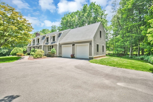 373 Broad Way, Coventry, CT 06238 - dutch colonial with asphalt driveway, a chimney, a garage, a front yard, and roof with shingles