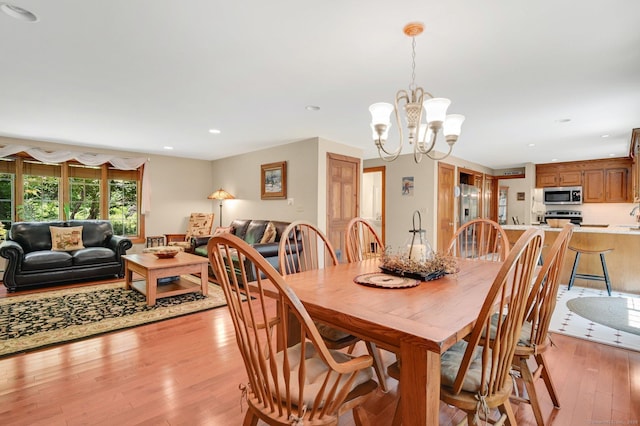 373 Broad Way, Coventry, CT 06238 - dining room with light wood-style floors, a chandelier, and recessed lighting