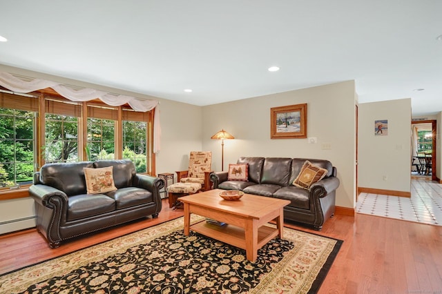 373 Broad Way, Coventry, CT 06238 - living area featuring plenty of natural light, wood finished floors, and recessed lighting