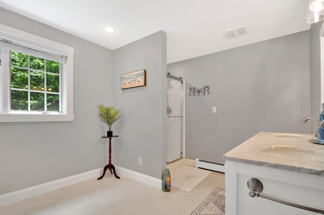 373 Broad Way, Coventry, CT 06238 - bathroom with a baseboard radiator, a stall shower, double vanity, and recessed lighting