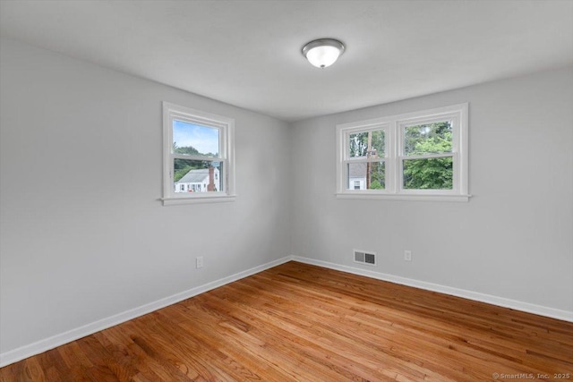 230 Green Rd, Manchester, CT 06042 - spare room featuring baseboards and light wood-style floors