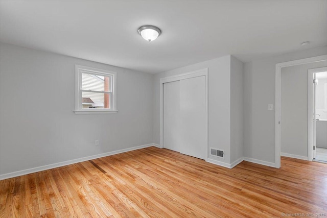 230 Green Rd, Manchester, CT 06042 - unfurnished bedroom with light wood finished floors and a closet