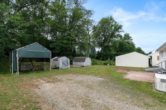 230 Green Rd, Manchester, CT 06042 - view of yard with a shed and a carport