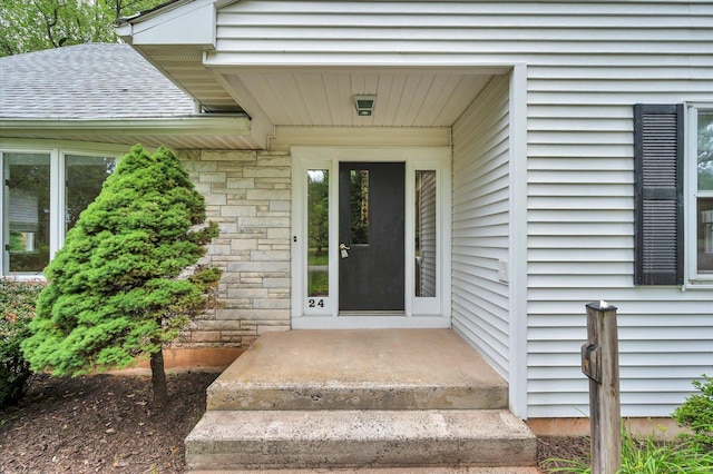 24 Iron Gate Ln, Cromwell, CT 06416 - doorway to property featuring stone siding
