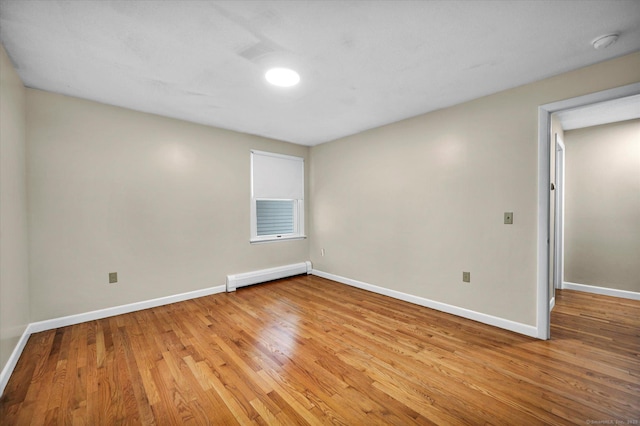 24 Iron Gate Ln, Cromwell, CT 06416 - spare room featuring baseboard heating, light wood finished floors, and a smoke detector