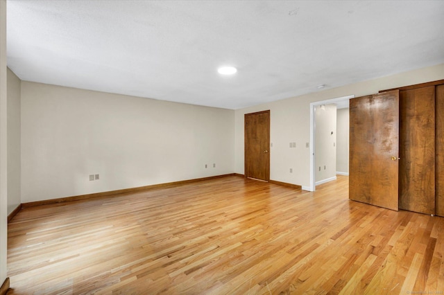 24 Iron Gate Ln, Cromwell, CT 06416 - unfurnished bedroom featuring light wood finished floors, two closets, and recessed lighting