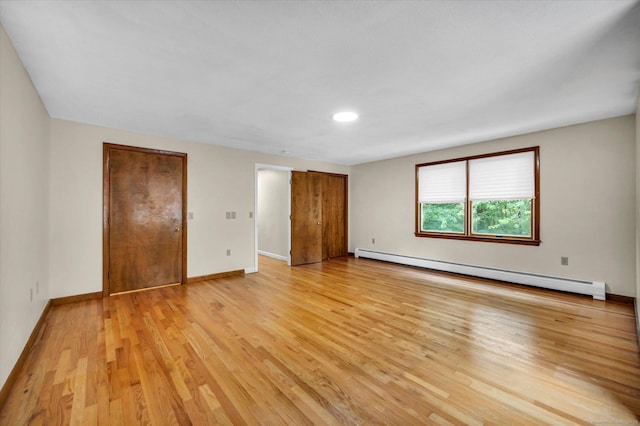24 Iron Gate Ln, Cromwell, CT 06416 - unfurnished bedroom with a baseboard radiator, light wood-style flooring, and recessed lighting