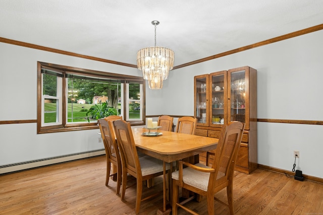33 Shawnee Ln, Monroe, CT 06468 - dining room featuring a baseboard radiator, light wood-type flooring, ornamental molding, and a chandelier