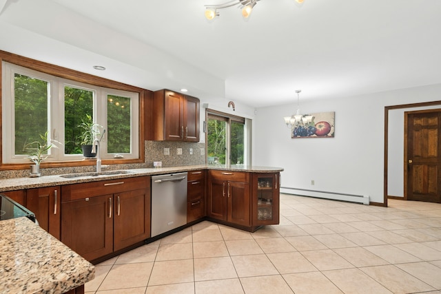 33 Shawnee Ln, Monroe, CT 06468 - kitchen with dishwasher, a baseboard radiator, a chandelier, a peninsula, and backsplash