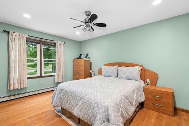 33 Shawnee Ln, Monroe, CT 06468 - bedroom featuring wood finished floors, a baseboard heating unit, recessed lighting, and ceiling fan