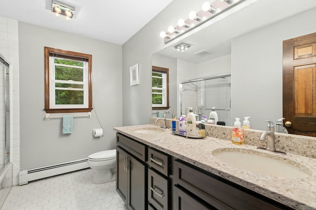 33 Shawnee Ln, Monroe, CT 06468 - full bath featuring a baseboard heating unit, plenty of natural light, double vanity, and tile patterned floors