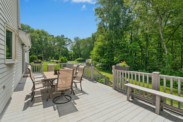 33 Shawnee Ln, Monroe, CT 06468 - wooden terrace featuring outdoor dining area and view of wooded area