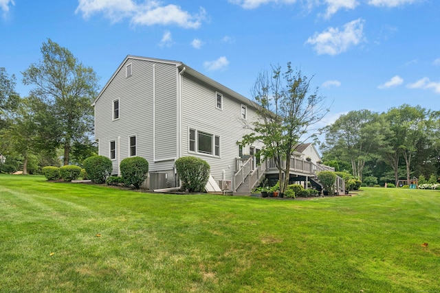33 Shawnee Ln, Monroe, CT 06468 - view of property exterior with stairway, a deck, and a yard