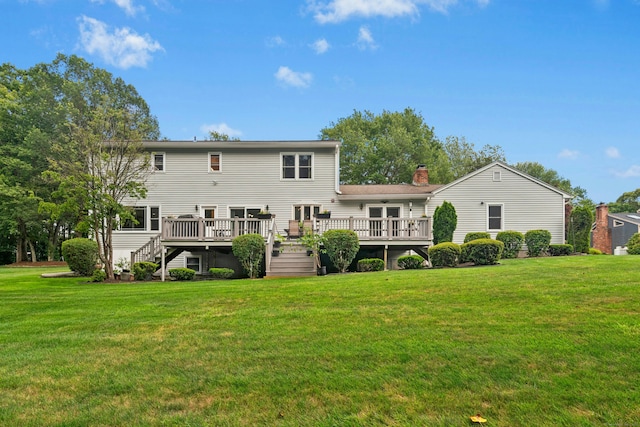 33 Shawnee Ln, Monroe, CT 06468 - rear view of property featuring stairway, a deck, a lawn, and a chimney