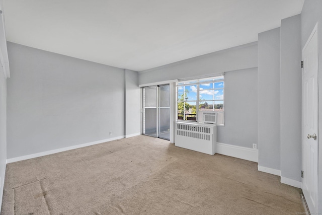 80 Cartright St Unit 8E, Bridgeport, CT 06604 - carpeted empty room featuring radiator and cooling unit