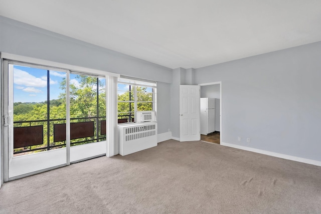 80 Cartright St Unit 8E, Bridgeport, CT 06604 - unfurnished room featuring carpet, radiator heating unit, and cooling unit