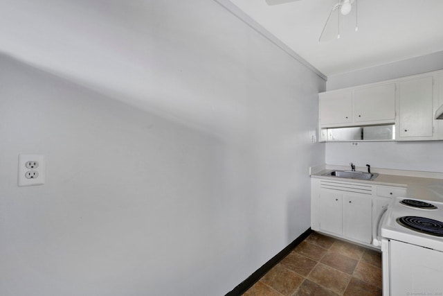 80 Cartright St Unit 8E, Bridgeport, CT 06604 - kitchen with white electric range oven, white cabinets, ceiling fan, and light countertops