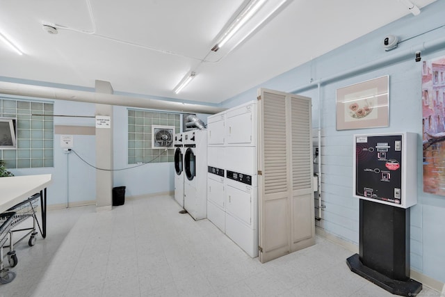 80 Cartright St Unit 8E, Bridgeport, CT 06604 - shared laundry room featuring stacked washing machine and dryer, washer and dryer, and light flooring