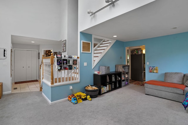 5 Legion Rd, Seymour, CT 06483 - carpeted living area with stairs, a towering ceiling, and recessed lighting