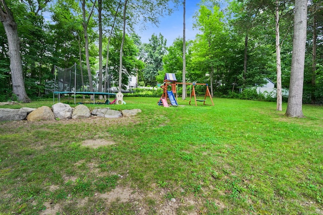 5 Legion Rd, Seymour, CT 06483 - view of green lawn with a trampoline, a playground, and view of wooded area