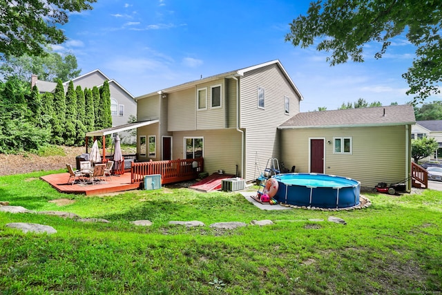 5 Legion Rd, Seymour, CT 06483 - back of property with a deck, an outdoor pool, and a lawn