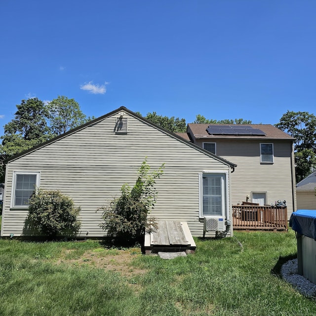 50 Meadow St, Meriden, CT 06451 - view of home's exterior with a yard, a deck, and cooling unit