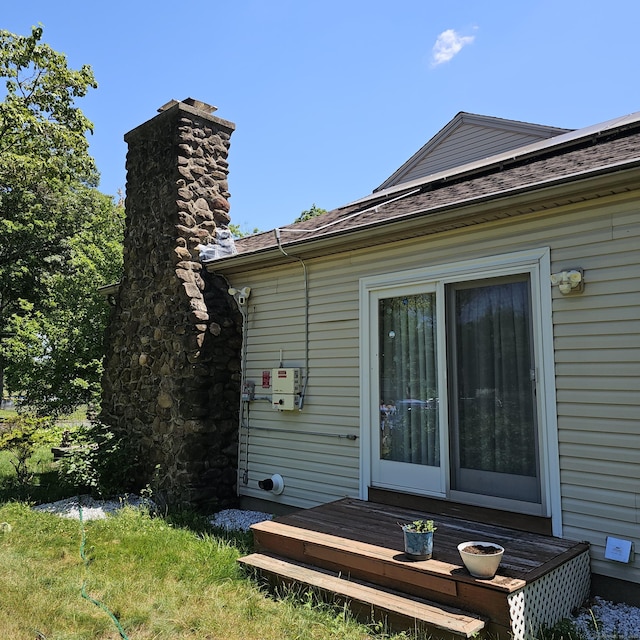 50 Meadow St, Meriden, CT 06451 - rear view of property featuring a chimney and a shingled roof