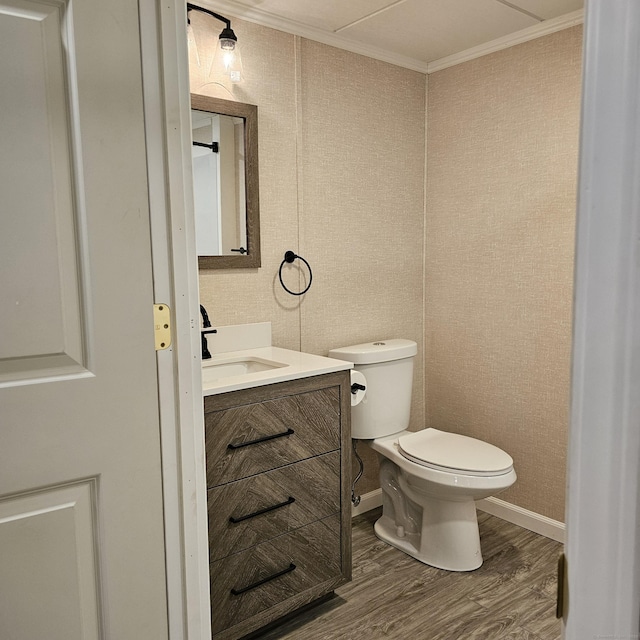 50 Meadow St, Meriden, CT 06451 - half bath featuring vanity, wood finished floors, and crown molding