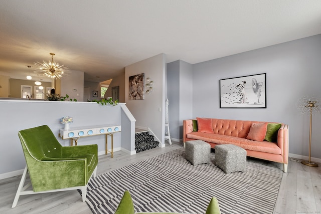 28 Biltmore Park Unit 28, Bloomfield, CT 06002 - living room featuring wood finished floors, a chandelier, and stairway