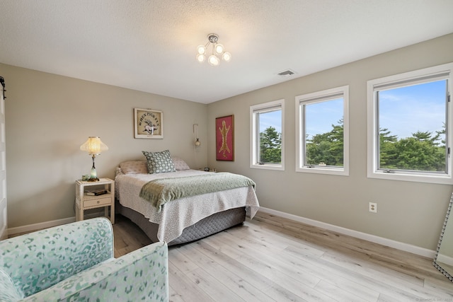 28 Biltmore Park Unit 28, Bloomfield, CT 06002 - bedroom featuring baseboards and light wood-style flooring