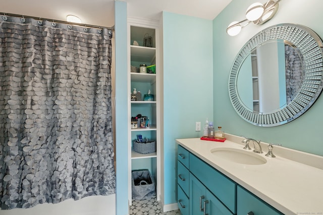 28 Biltmore Park Unit 28, Bloomfield, CT 06002 - full bath featuring vanity, a shower with curtain, and built in features