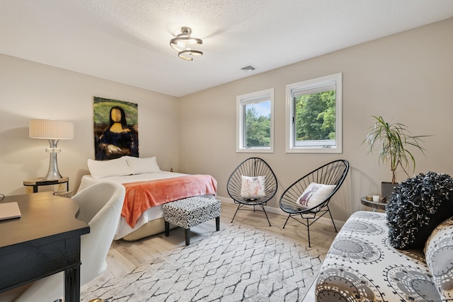 28 Biltmore Park Unit 28, Bloomfield, CT 06002 - bedroom featuring light wood finished floors and baseboards