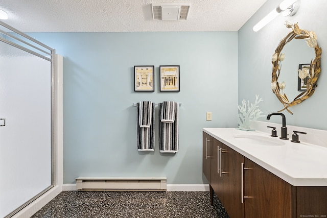 28 Biltmore Park Unit 28, Bloomfield, CT 06002 - full bath with baseboard heating, speckle patterned floor, vanity, a shower stall, and a textured ceiling