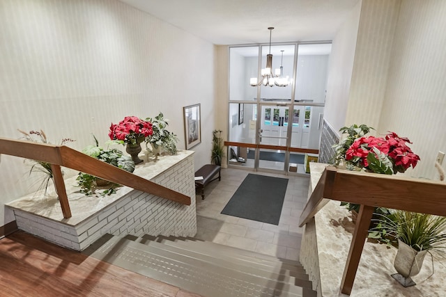 34A Padanaram Ave Unit 120, Danbury, CT 06811 - foyer entrance with a chandelier and wallpapered walls