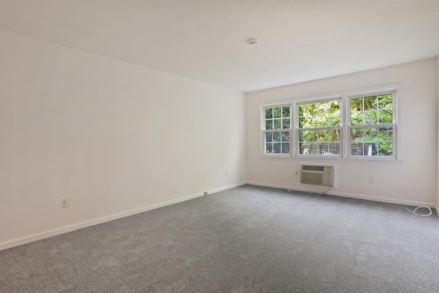 34A Padanaram Ave Unit 120, Danbury, CT 06811 - unfurnished room featuring an AC wall unit and carpet